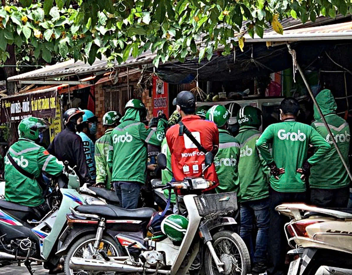 Cơ quan cạnh tranh yêu cầu Grab làm rõ cơ chế giá cước, phí và chiết khấu